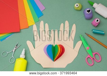 Step By Step Instructions. Hands With A Rainbow Heart. Step 7 Glue The Heart To The Hands. Done. Lgb