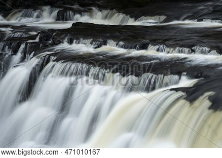 Beautiful Peaceful Landscape Image Of Aysgarth Falls In Yorkshire Dales In England During Winter Mor