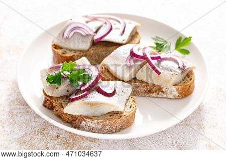 Herring Sandwich. Toast With Bread, Herring And Onion. Top View