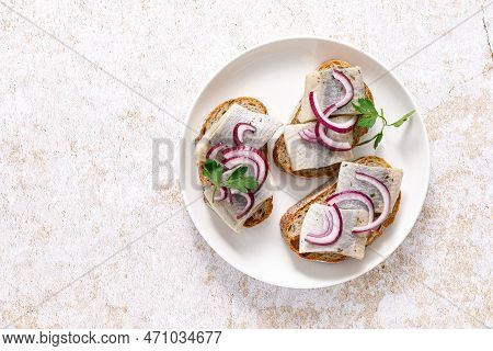Herring Sandwich. Toast With Bread, Herring And Onion. Top View