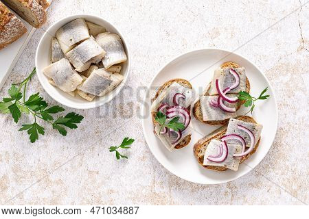 Herring Sandwich. Toast With Bread, Herring And Onion. Top View