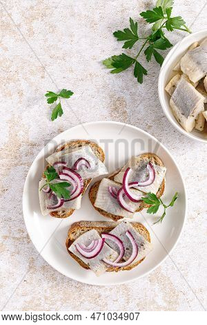 Herring Sandwich. Toast With Bread, Herring And Onion. Top View