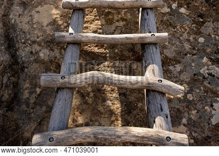 Close Up Of Rungs On Wooden Ladder On Historic Route To Cliff Dwelling