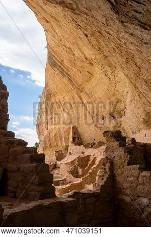 Curving Slope Of Cliff Covers Dwelling Built Into It In Mesa Verde National Park