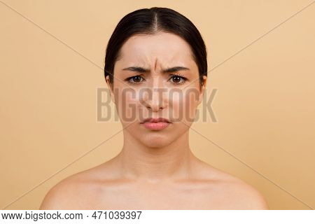 Glabellar Lines. Unhappy Young Indian Woman Frowning While Looking At Camera