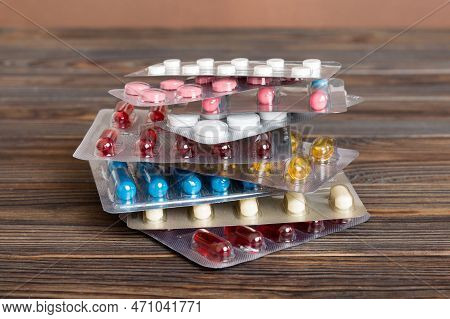 Too Many Different Pill Cartridges Stacked. Selective Focus. Packs Of Blister Pills With Tablets. Co