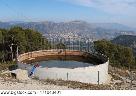 Maigmo Mountain Range,tibi, Alicante, Spain, February 17, 2023: Fire Fighting Water Pond In Maigmo M