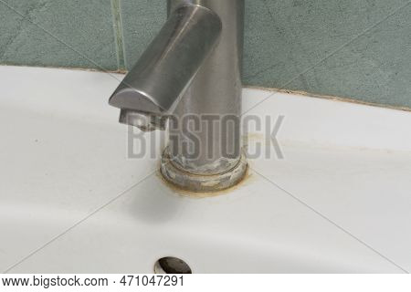 Faucet Limescale. Dirty Faucet With Stain And Limescale In Bathroom. Selective Focus, Shallow Depth 