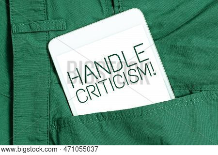 Handwriting Text Handle Criticism. Business Idea Process Of Withstanding Valid And Well Reasoned Opi