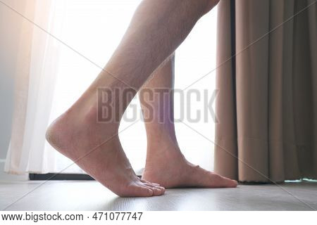 Leg Of Woman Is On The Ground. She Is About To Walk Exercise  Health And Relaxation Concepts