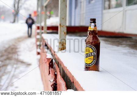 Moscow February 19 2023, A Glass Bottle Of Beer Is Lying On The Ground, An Empty Bottle Of Beer Outs