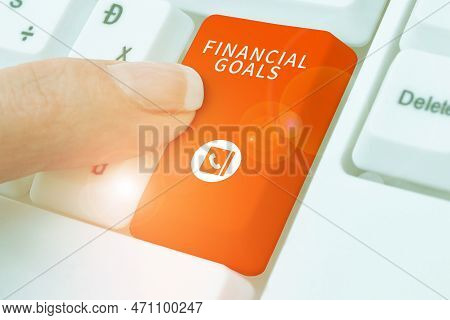 Handwriting Text Financial Goals. Business Concept Targets Usually Driven By Specific Future Financi