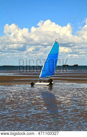 Arromanches, France - October 14 2012: Land Sailing On Gold Beach In Normandy. In The Background, We