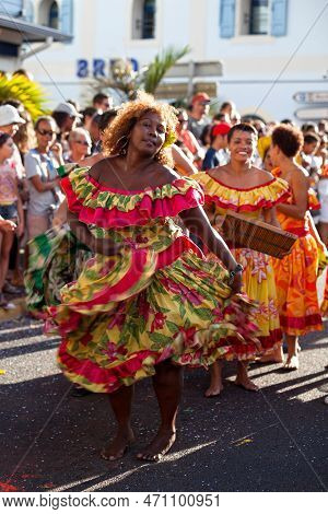 Saint-gilles Les Bains, La Réunion - June 25 2017: Group Of Creole Dancers (one Of Them Playing With
