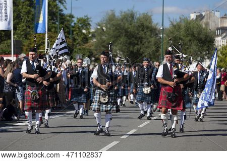 Quimper, France - July 24 2022: Musicians Of The Club Kilt Du Pays De Lorient Performing During The 