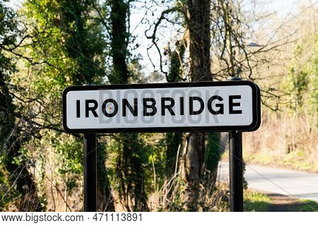 Uk Road Sign Stating Shropshire Toen Of Ironbridge