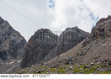 Scenic Mountain Landscape With Two Big Stone Bumps Under Cloudy Sky. Beautiful Mountain Scenery With