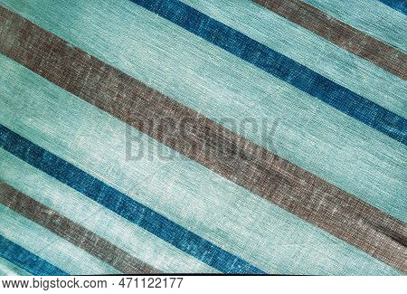Multicolored Linen Towel. Ukrainian Towel Is Decorated With Colorful Stripes. Background Of Homespun