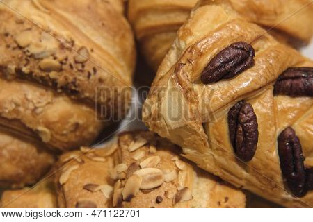 French Puff Pastry And Croissant With Toppings. Freshly Baked Sweet Buns Couple Flaky Pastry With Al