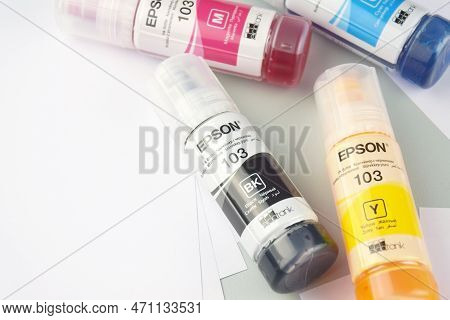 Four Bottles Of Ink Epson, Yellow, Red, Blue, Black, Built-in To The Epson L3150 Series Printer.