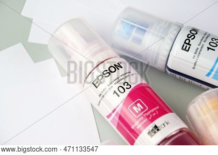 Four Bottles Of Ink Epson, Yellow, Red, Blue, Black, Built-in To The Epson L3150 Series Printer.