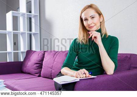 Business Woman Works In The Office. Iindependent Lady Who Studies From A Distance. Learning At Home.