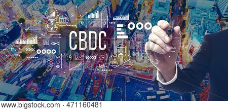 Cbdc - Central Bank Digital Currency Concept With Businessman In A City At Night