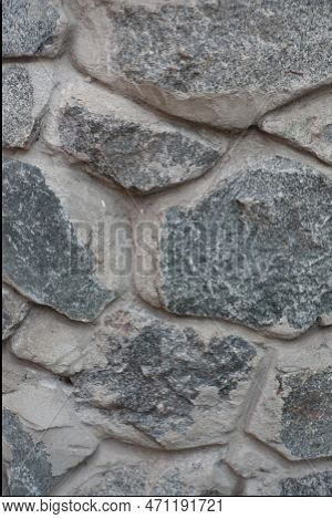 Close View Of Wall Made Of Grey Natural Shape Fieldstones