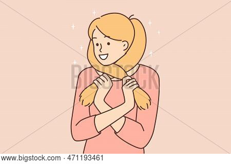 Cute Teenager Girl Wrapping Hair Around Face Smiles And Dreams About Guy She Likes From School. Youn