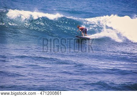 Hossegor, France - February Circa , 2019. An Unidentified Surfer Man Catching Riding On An Ocean Wav