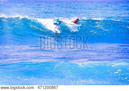 Hossegor, France - February Circa , 2019. An Unidentified Surfer Man Catching Riding On An Ocean Wav