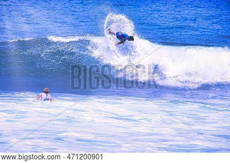 Hossegor, France - February Circa , 2019. An Unidentified Surfer Man Catching Riding On An Ocean Wav