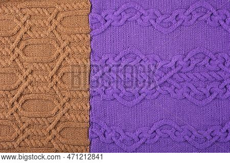 Knitted Lilac And Brown Background. Large Knitted Fabric With A Pattern. Close-up Of A Knitted Blank