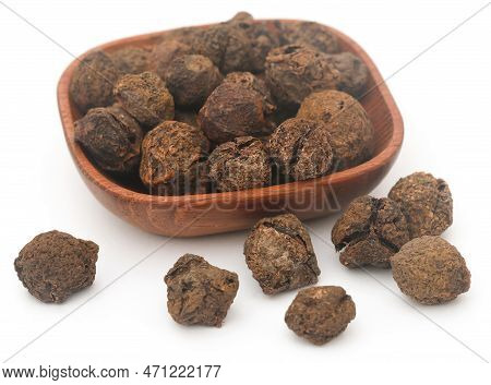Dried Amla Fruits In Bowl Over White Background