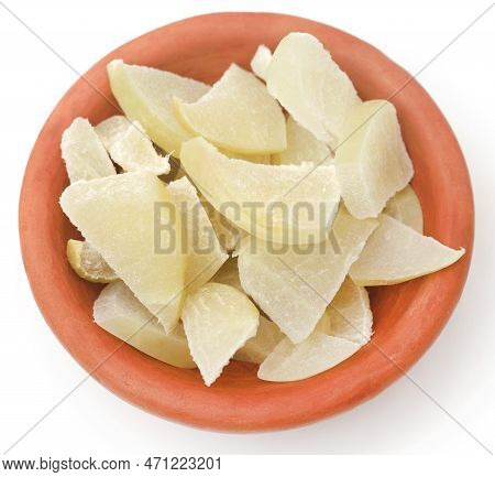 Sliced Amla Fruits In A Bowl Over White Background
