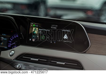 Moscow, Russia - December 18, 2021 Android Auto On The Screen. Homescreen. Modern Car. Interior Clos