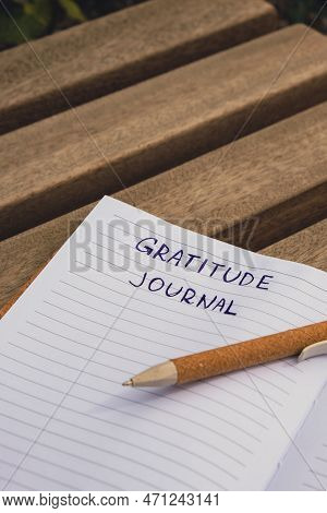 Writing Gratitude Journal On Wooden Bench. Today I Am Grateful For. Self Discovery Journal, Self Ref