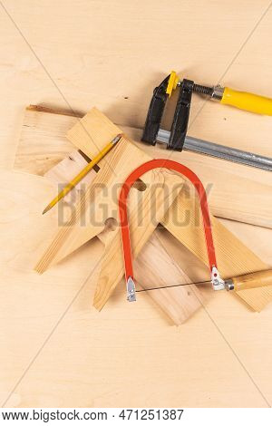Carpentry Profession Ideas. Variety Of Separate Lineup Of Assorted Work Tools On Wood.