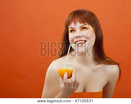 Beautiful Girl Drinks Juice