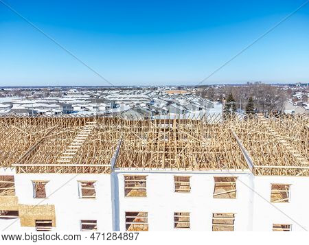 Aerial Drone View Of A Multifamily Apartment Complex Under Construction.