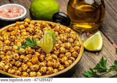 Fried Roasted Spicy Chickpeas Or Indian Chana Or Chole With Lime. Tasty Vegetarian And Vegan Chickpe