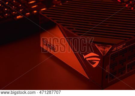 Computer Ac Power Supply Asus Rog Thor 1000W On A Dark Background.