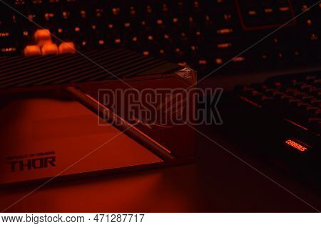 Computer Ac Power Supply Asus Rog Thor 1000W On A Dark Background.