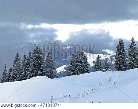 Beautiful Low Winter Clouds And Fog Condensation In The Swiss Alps Above The Tourist Resorts Of Valb