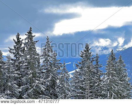 Beautiful Low Winter Clouds And Fog Condensation In The Swiss Alps Above The Tourist Resorts Of Valb