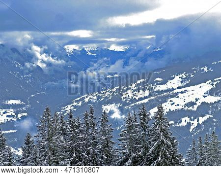 Beautiful Low Winter Clouds And Fog Condensation In The Swiss Alps Above The Tourist Resorts Of Valb