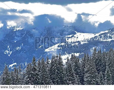 Beautiful Low Winter Clouds And Fog Condensation In The Swiss Alps Above The Tourist Resorts Of Valb