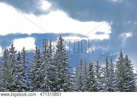 Beautiful Low Winter Clouds And Fog Condensation In The Swiss Alps Above The Tourist Resorts Of Valb