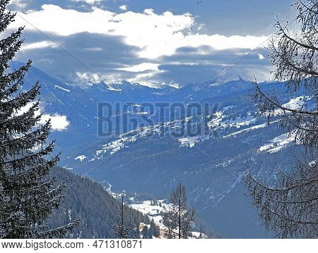 Beautiful Low Winter Clouds And Fog Condensation In The Swiss Alps Above The Tourist Resorts Of Valb