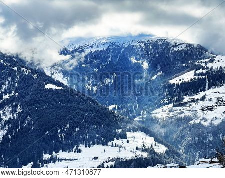 Beautiful Low Winter Clouds And Fog Condensation In The Swiss Alps Above The Tourist Resorts Of Valb